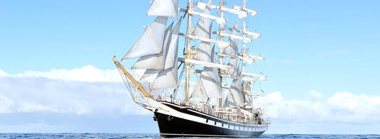 White Ship & Blue Sky Wall Murals